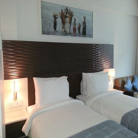 Imagen de la habitación del Hotel Ambar Sarovar Portico. Foto 17