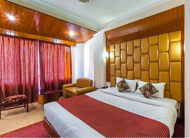 Imagen de la habitación del Hotel Ambarish Grand Residency. Foto 2