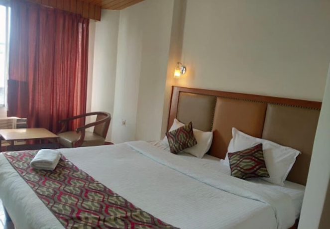 Imagen de la habitación del Hotel Ambarish Grand Residency. Foto 6