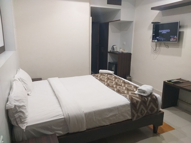 Imagen de la habitación del Hotel Ambarish Grand Residency. Foto 7