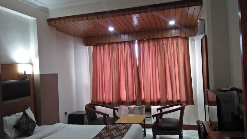 Imagen de la habitación del Hotel Ambarish Grand Residency. Foto 10