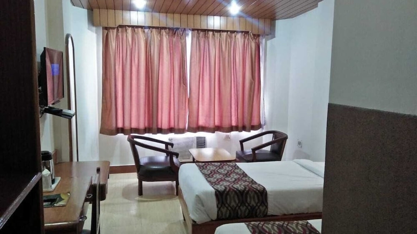 Imagen de la habitación del Hotel Ambarish Grand Residency. Foto 11