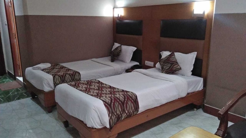 Imagen de la habitación del Hotel Ambarish Grand Residency. Foto 12