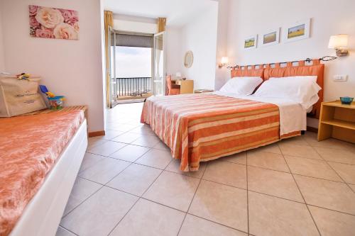 Imagen de la habitación del Hotel Ambasciatori Beach Front Breakfast e Brunch XXL fino alle 12 30. Foto 8