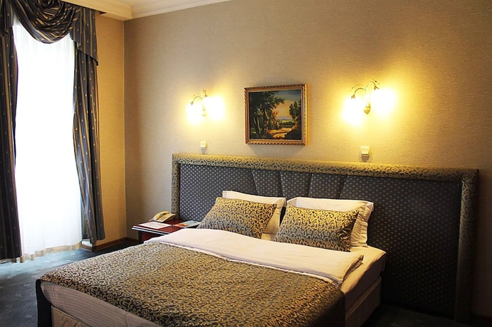 Imagen de la habitación del Hotel Ambassador Almaty. Foto 7