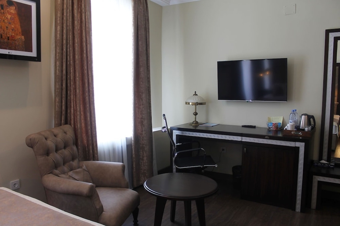Imagen de la habitación del Hotel Ambassador Almaty. Foto 13