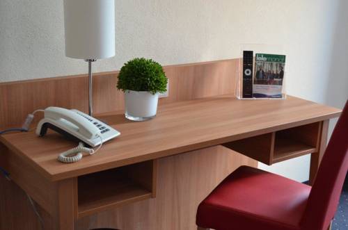 Imagen de la habitación del Hotel Ambassador Apparthotel. Foto 8