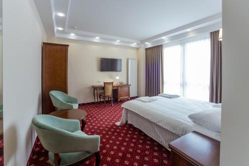 Imagen de la habitación del Hotel Ambassador, Chisinau. Foto 8