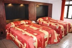 Imagen de la habitación del Hotel Ambassador Cholula. Foto 4