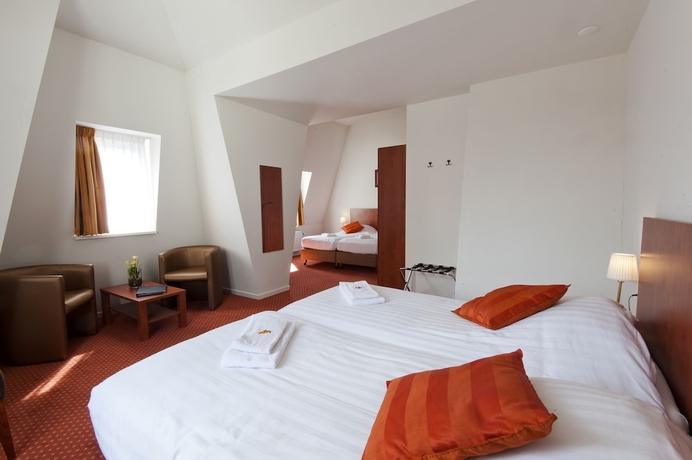 Imagen de la habitación del Hotel Ambassador City Centre. Foto 6