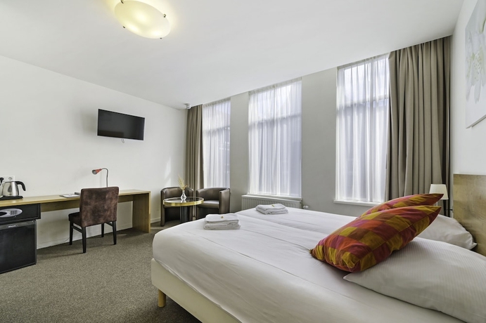 Imagen de la habitación del Hotel Ambassador City Centre. Foto 15