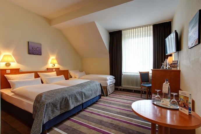 Imagen de la habitación del Hotel Ambassador Duesseldorf. Foto 12