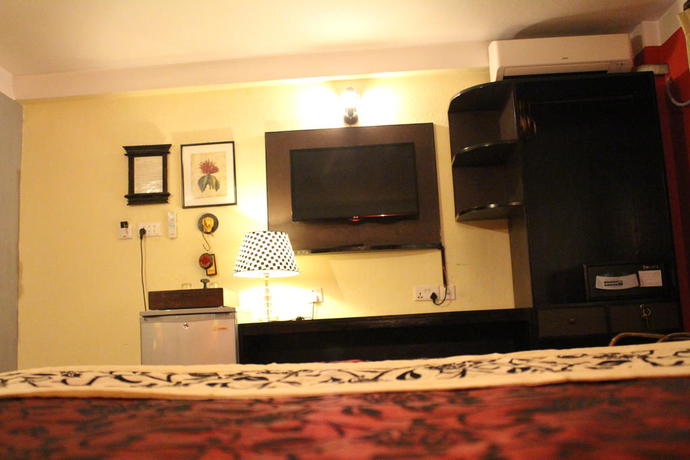 Imagen de la habitación del Hotel Ambassador Garden Home. Foto 7