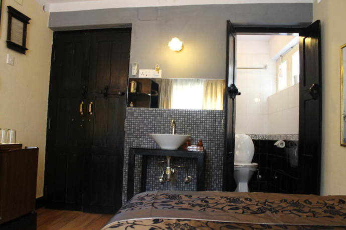 Imagen de la habitación del Hotel Ambassador Garden Home. Foto 8