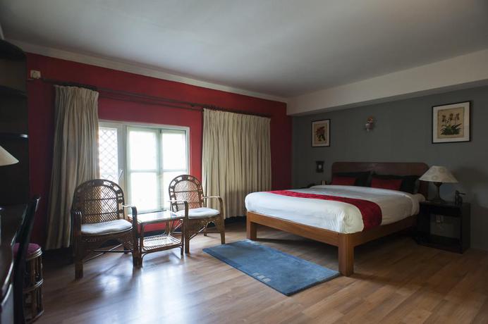 Imagen de la habitación del Hotel Ambassador Garden Home. Foto 9