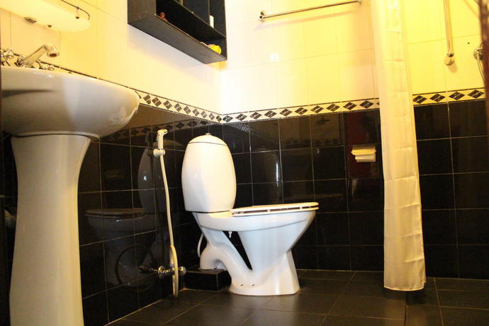 Imagen de la habitación del Hotel Ambassador Garden Home. Foto 11
