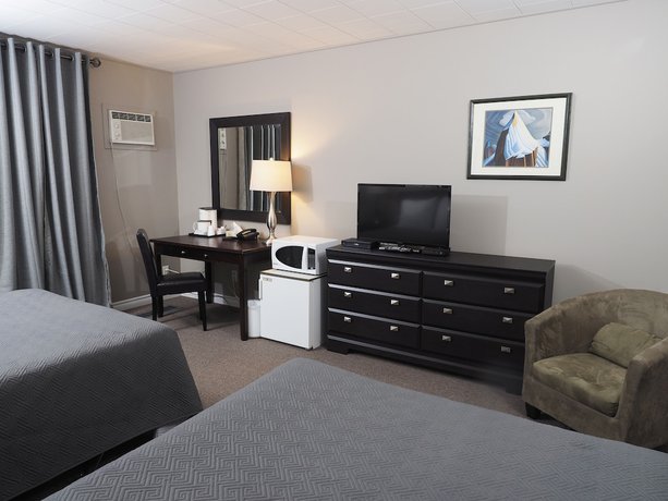 Imagen de la habitación del Hotel Ambassador Motel. Foto 4