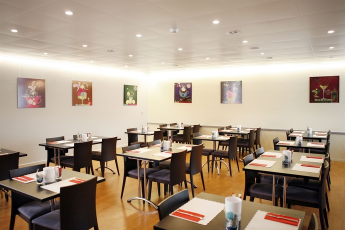 Imagen del bar/restaurante del Hotel Ambassador Self Check-in. Foto 3
