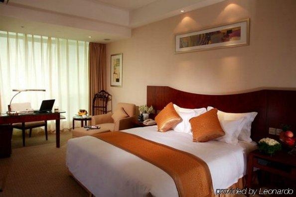 Imagen de la habitación del Hotel Ambassador, Shanghai. Foto 3