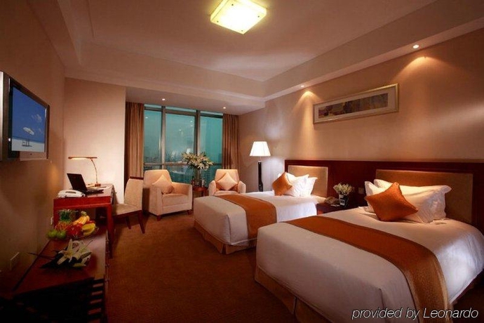 Imagen de la habitación del Hotel Ambassador, Shanghai. Foto 4