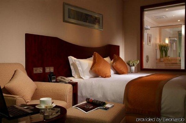 Imagen de la habitación del Hotel Ambassador, Shanghai. Foto 6