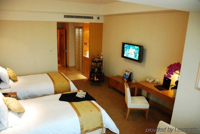 Imagen de la habitación del Hotel Ambassador, Shanghai. Foto 7