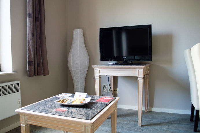 Imagen del bar/restaurante del Hotel Ambassador Suites Antwerp. Foto 3