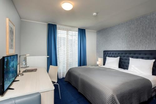Imagen de la habitación del Hotel Ambassador-berlin Gr&uuml;nau. Foto 7
