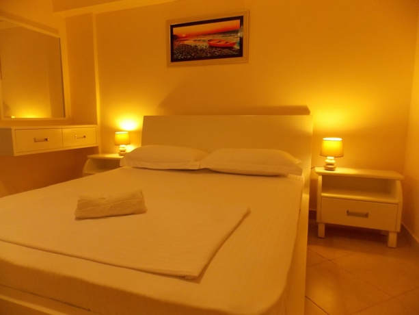 Imagen de la habitación del Hotel Amber Apartments. Foto 6