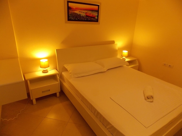 Imagen de la habitación del Hotel Amber Apartments. Foto 7