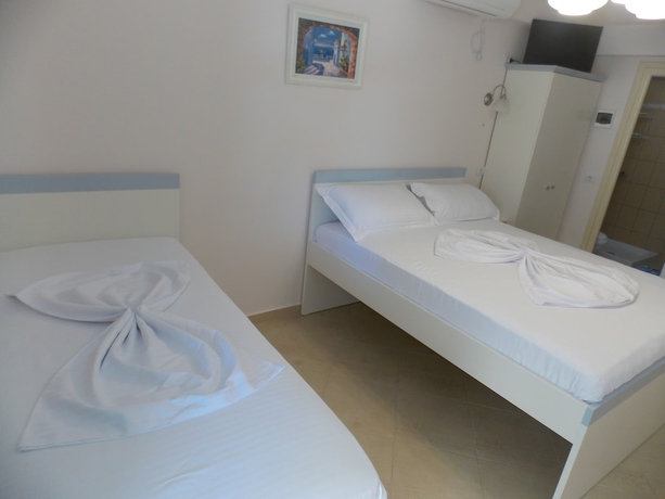 Imagen de la habitación del Hotel Amber Apartments. Foto 10