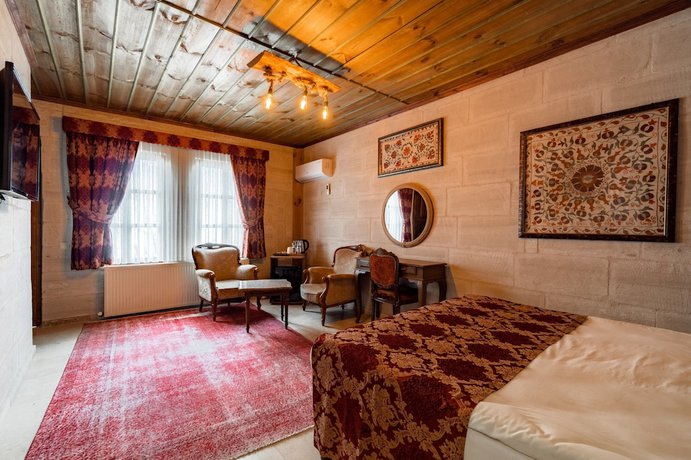 Imagen de la habitación del Hotel Amber Cave Suites. Foto 5