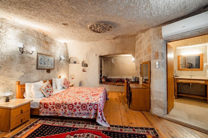 Imagen de la habitación del Hotel Amber Cave Suites. Foto 14