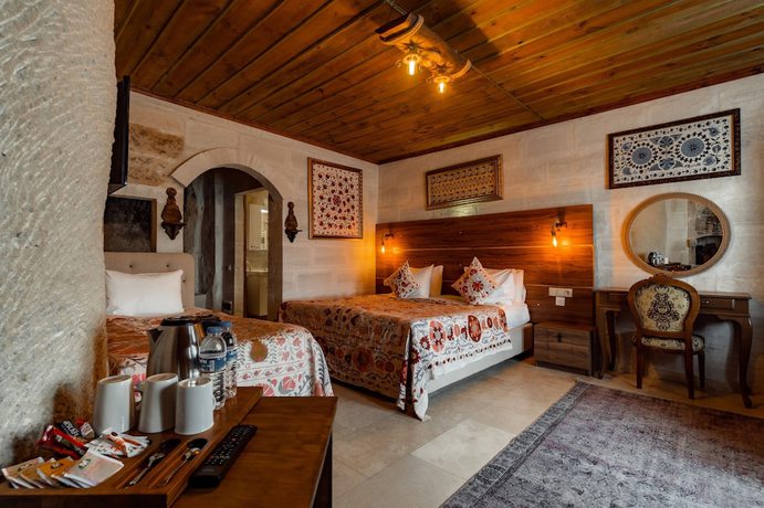 Imagen de la habitación del Hotel Amber Cave Suites. Foto 17