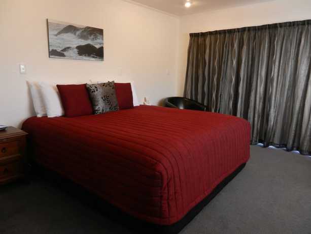 Imagen de la habitación del Hotel Amber Court Motel. Foto 18