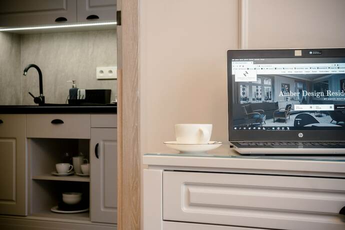 Imagen de la habitación del Hotel Amber Design Residence. Foto 11