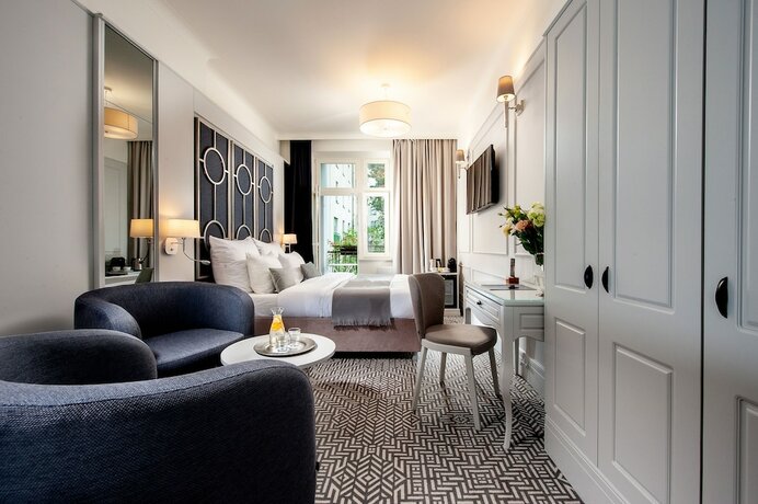 Imagen de la habitación del Hotel Amber Design Residence. Foto 13