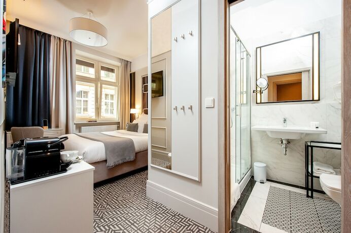 Imagen de la habitación del Hotel Amber Design Residence. Foto 14