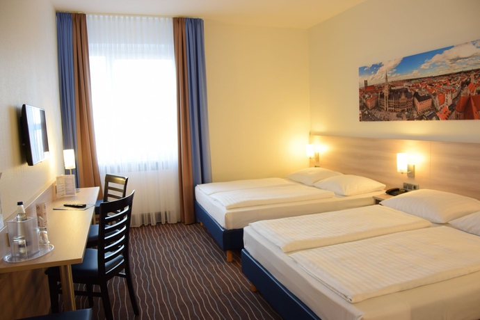 Imagen de la habitación del Hotel Amber Econtel München. Foto 5