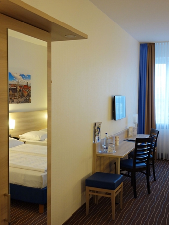 Imagen de la habitación del Hotel Amber Econtel München. Foto 8