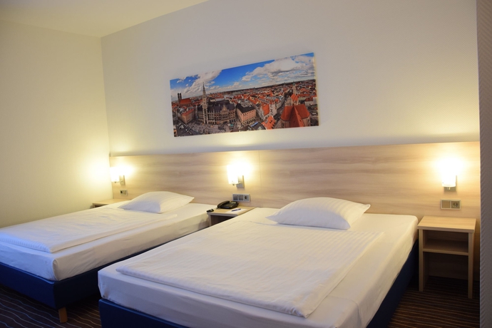 Imagen de la habitación del Hotel Amber Econtel München. Foto 9