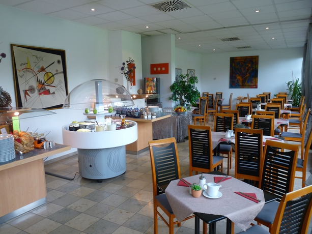 Imagen del bar/restaurante del Hotel Amber Econtel München. Foto 3