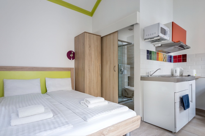 Imagen de la habitación del Hotel Amber Gardenview Studios. Foto 6