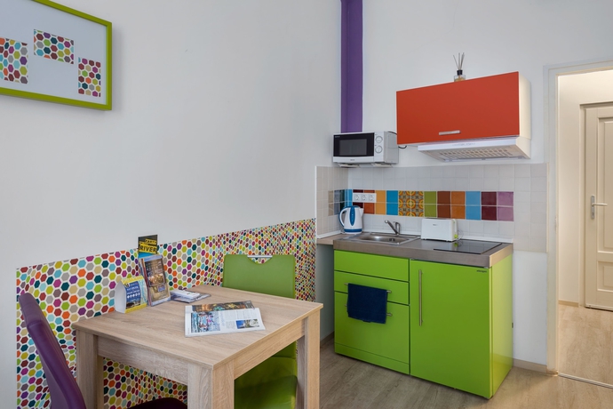 Imagen de la habitación del Hotel Amber Gardenview Studios. Foto 7