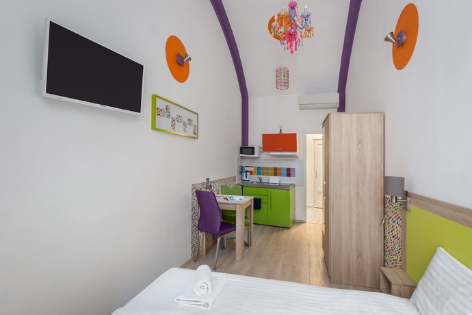 Imagen de la habitación del Hotel Amber Gardenview Studios. Foto 8