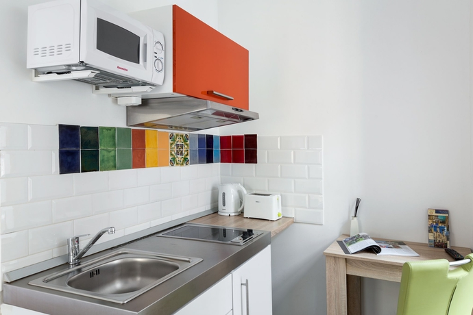 Imagen de la habitación del Hotel Amber Gardenview Studios. Foto 10