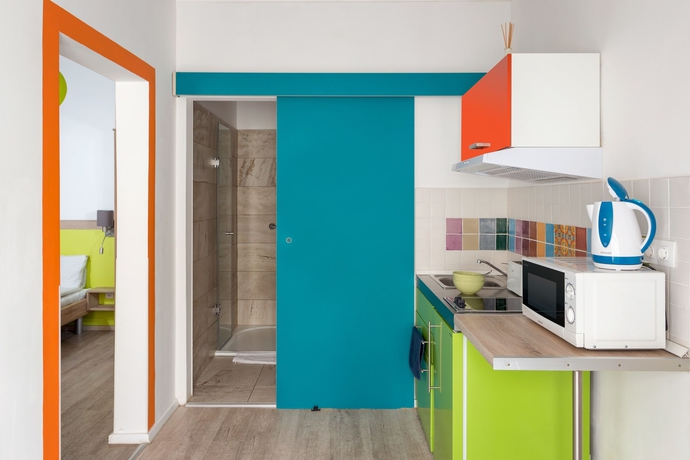 Imagen de la habitación del Hotel Amber Gardenview Studios. Foto 11