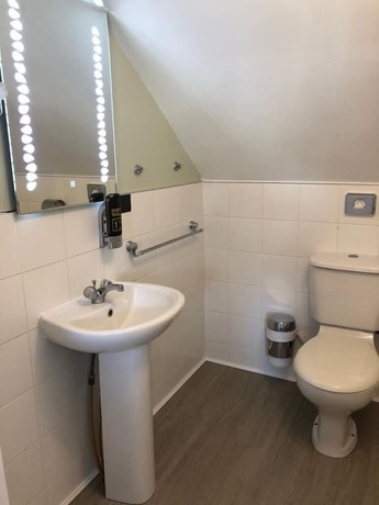 Imagen de la habitación del Hotel Amber Heights Guesthouse. Foto 13