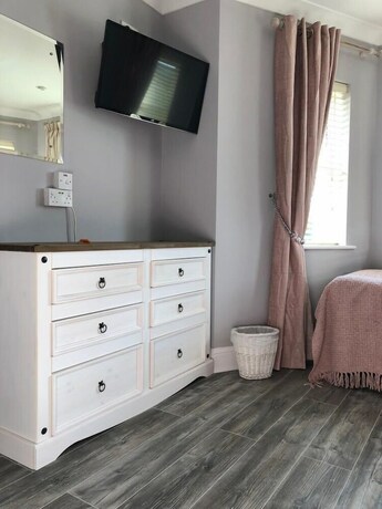 Imagen de la habitación del Hotel Amber Heights Guesthouse. Foto 20