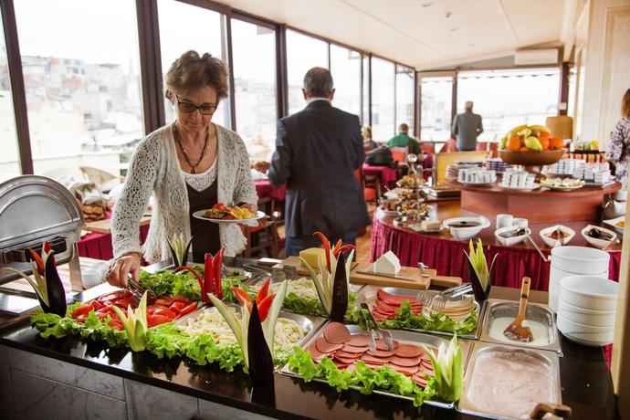 Imagen del bar/restaurante del Hotel Amber Hotel - Special Class. Foto 8